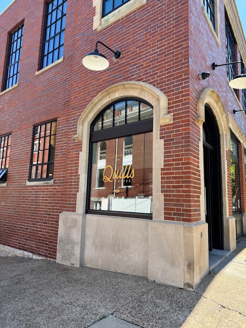 Storefront of Quills Coffee, specialty coffee shop in Louisville