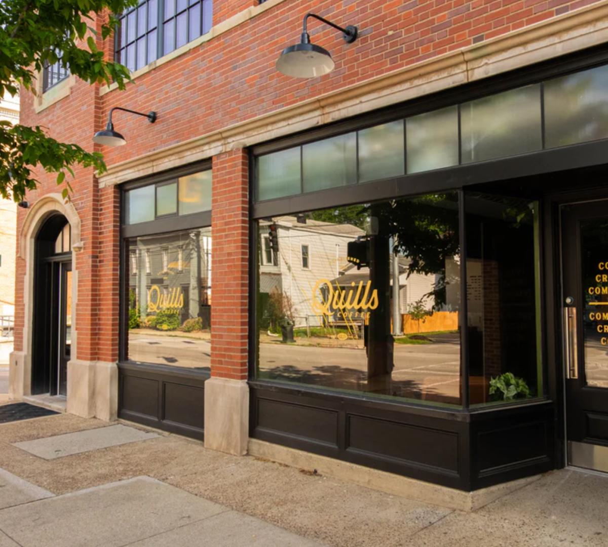 Storefront of Quills Coffee, specialty coffee shop in Louisville