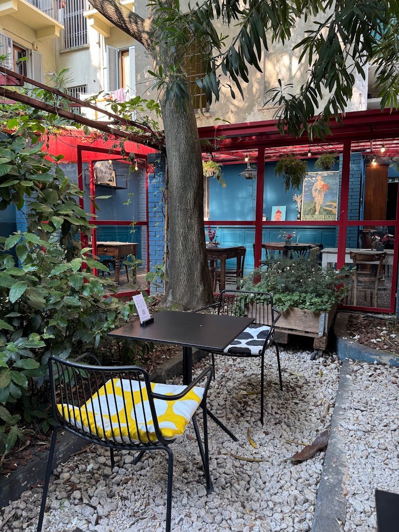 Storefront of ONEST, specialty coffee shop in Milan