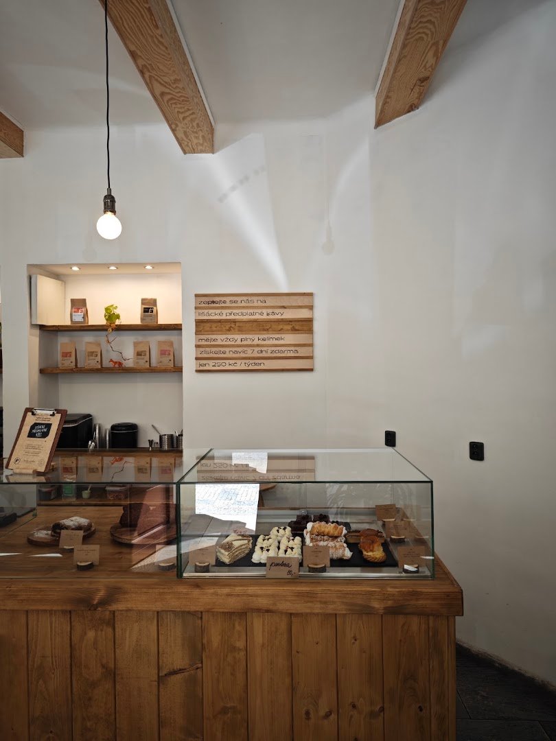 Interior of two dots coffee & pastries, specialty coffee shop in Prague