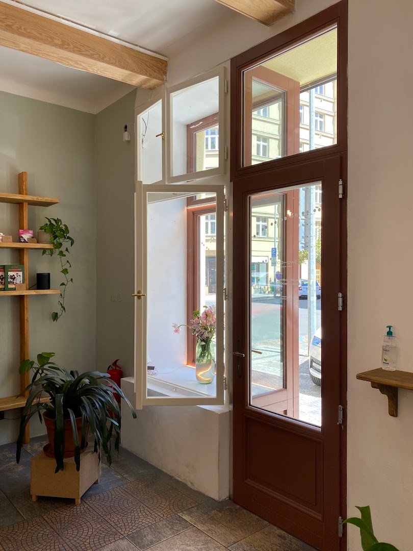 Interior of two dots coffee & pastries, specialty coffee shop in Prague