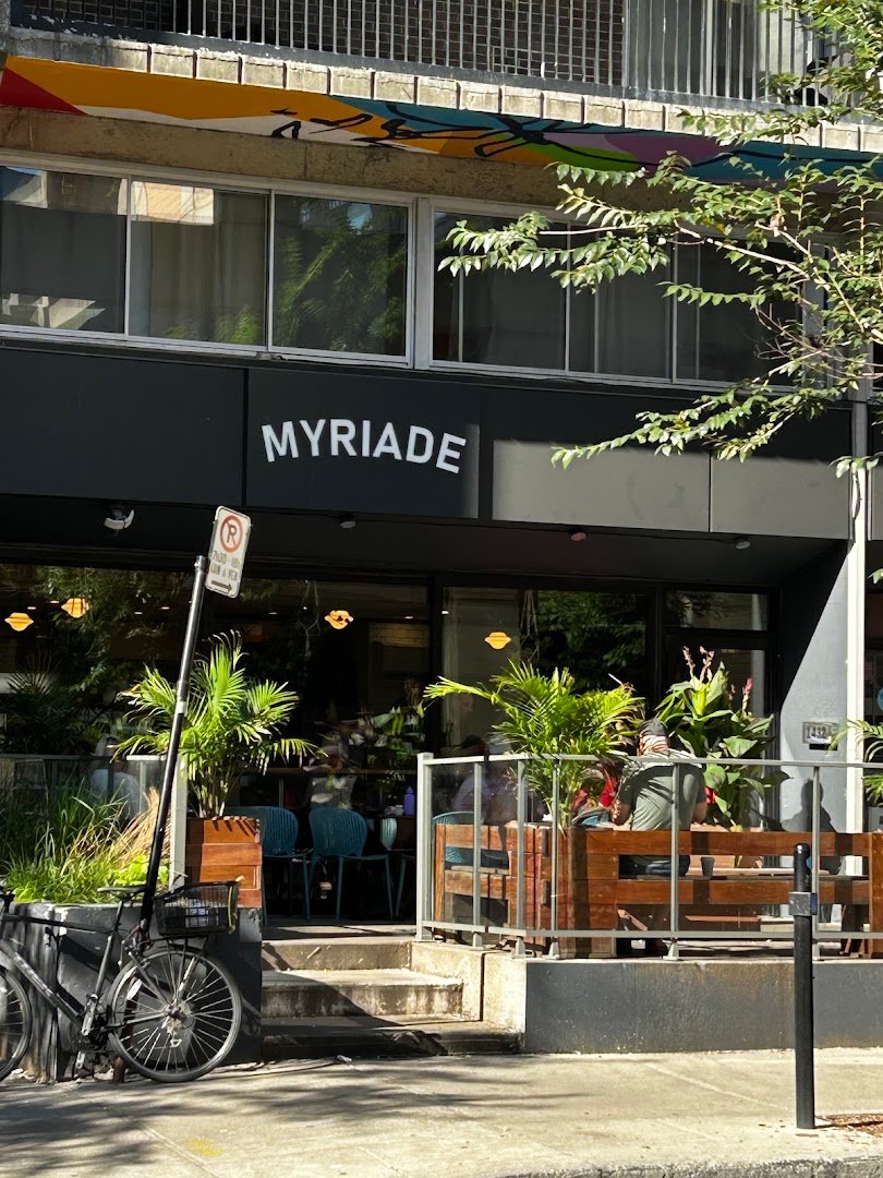 Storefront of Café Myriade - Le Plateau, specialty coffee shop in Montreal