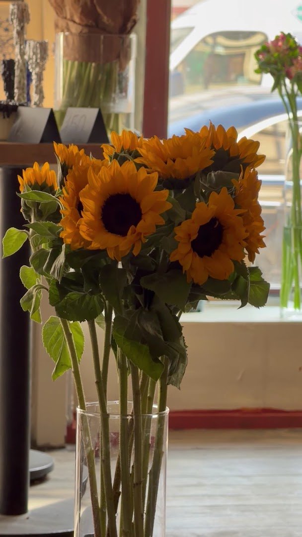 Interior of We are. Coffee and Flowers, specialty coffee shop in Warsaw