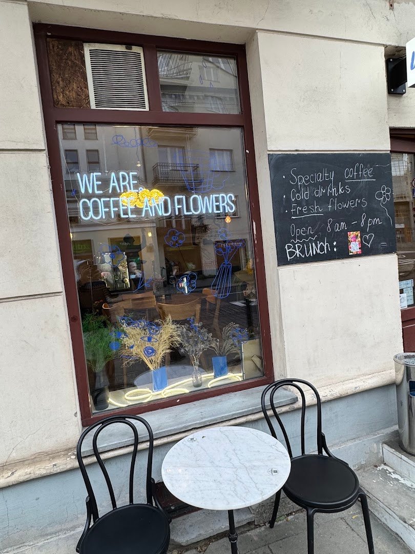 Storefront of We are. Coffee and Flowers, specialty coffee shop in Warsaw