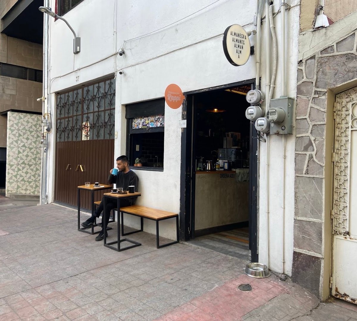 Storefront of Almanegra Café, specialty coffee shop in Mexico City