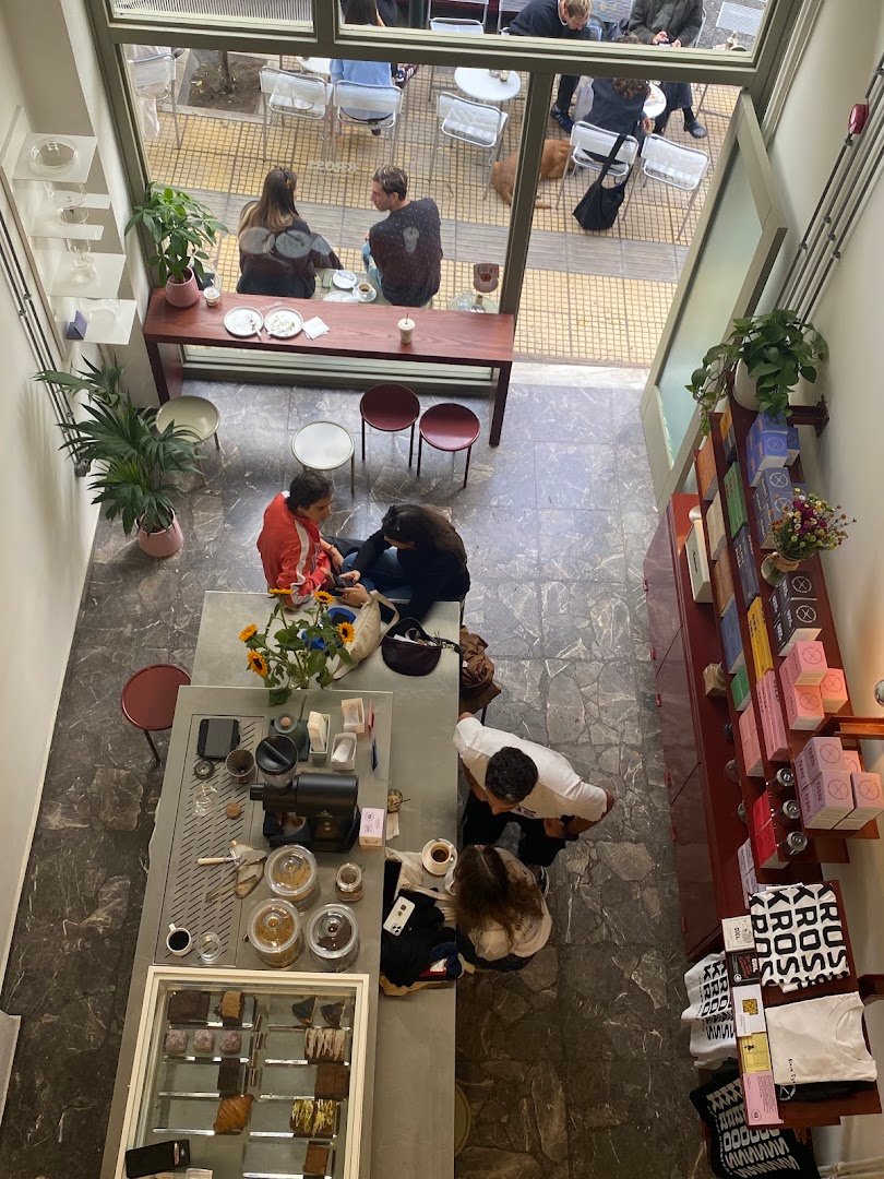 Interior of Kross Coffee Roasters Pagkrati, specialty coffee shop in Athens