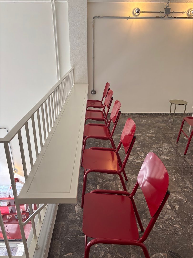 Interior of Kross Coffee Roasters Pagkrati, specialty coffee shop in Athens