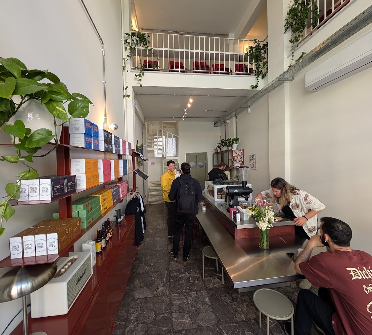 Interior of Kross Coffee Roasters Pagkrati, specialty coffee shop in Athens