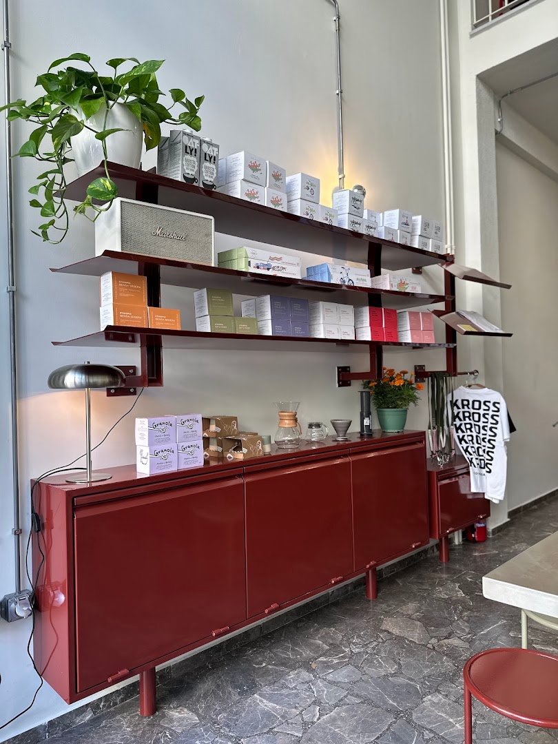 Interior of Kross Coffee Roasters Pagkrati, specialty coffee shop in Athens