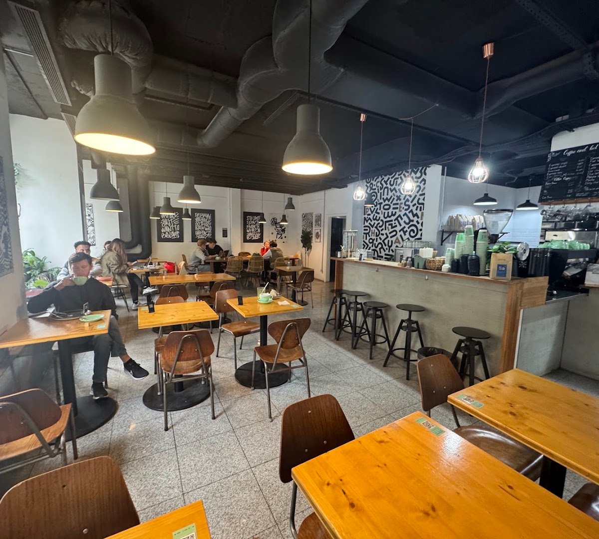 Interior of Copenhagen Coffee Lab - Alcântara, specialty coffee shop in Lisbon