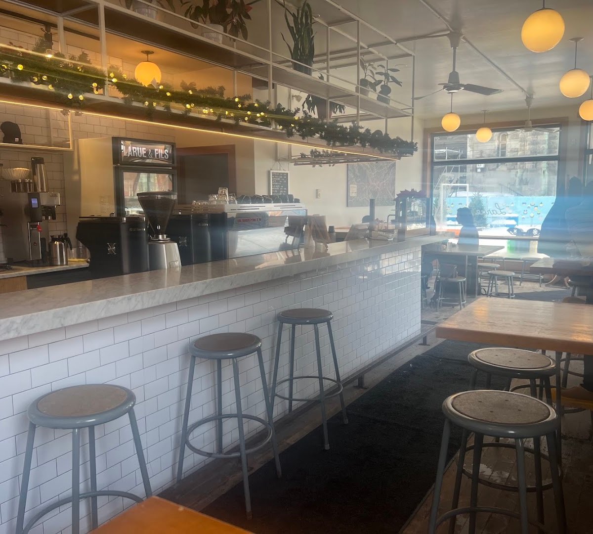 Interior of Cafe Larue & Fils, specialty coffee shop in Montreal