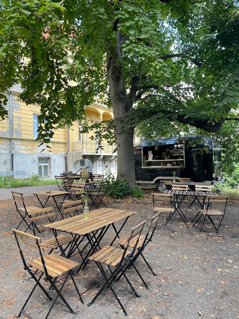 Storefront of Tusculum Coffee point, specialty coffee shop in Prague