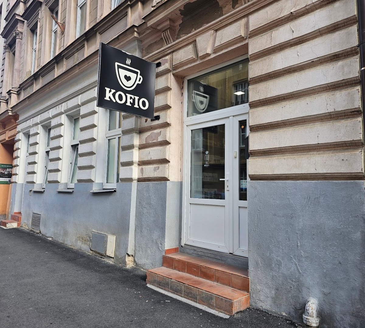 Storefront of KOFIO.cz, specialty coffee shop in Prague
