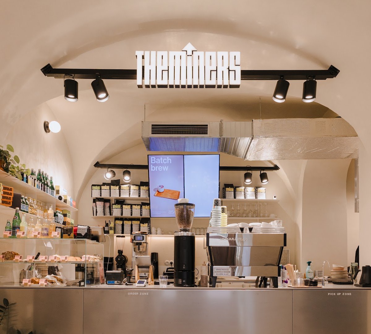 Interior of The Miners Coffee Charles Bridge, specialty coffee shop in Prague