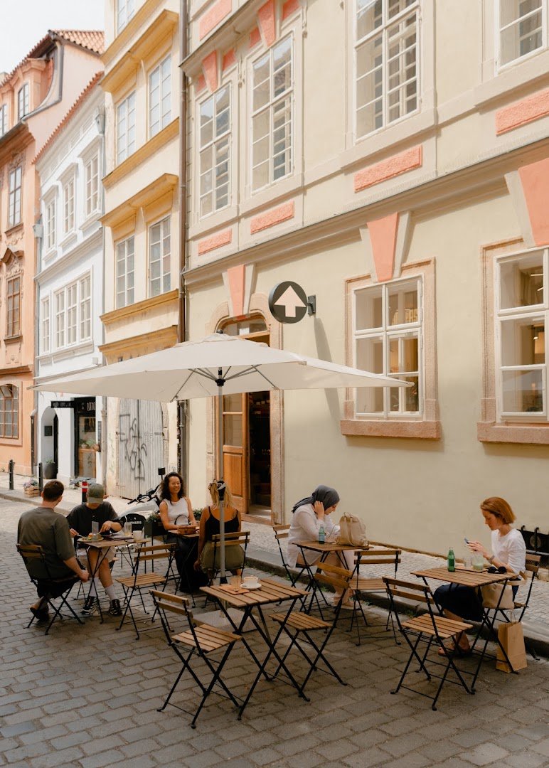 Storefront of The Miners Coffee Charles Bridge, specialty coffee shop in Prague