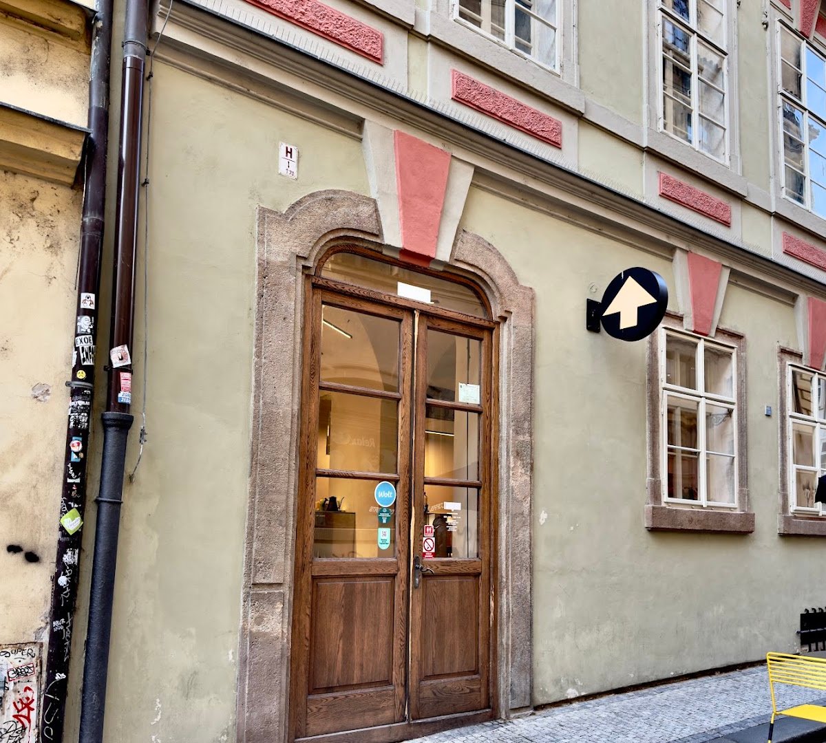 Storefront of The Miners Coffee Charles Bridge, specialty coffee shop in Prague