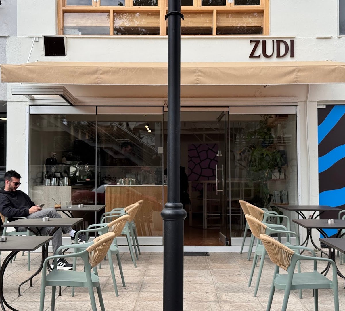 Storefront of Zudi Coffee Co, specialty coffee shop in Athens