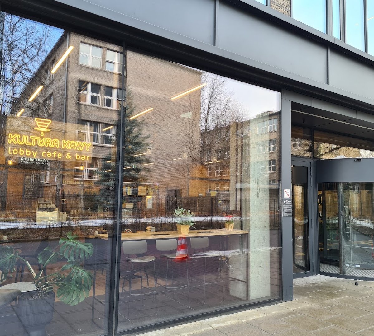 Storefront of Kultura Kawy lobby cafe & bar, specialty coffee shop in Warsaw