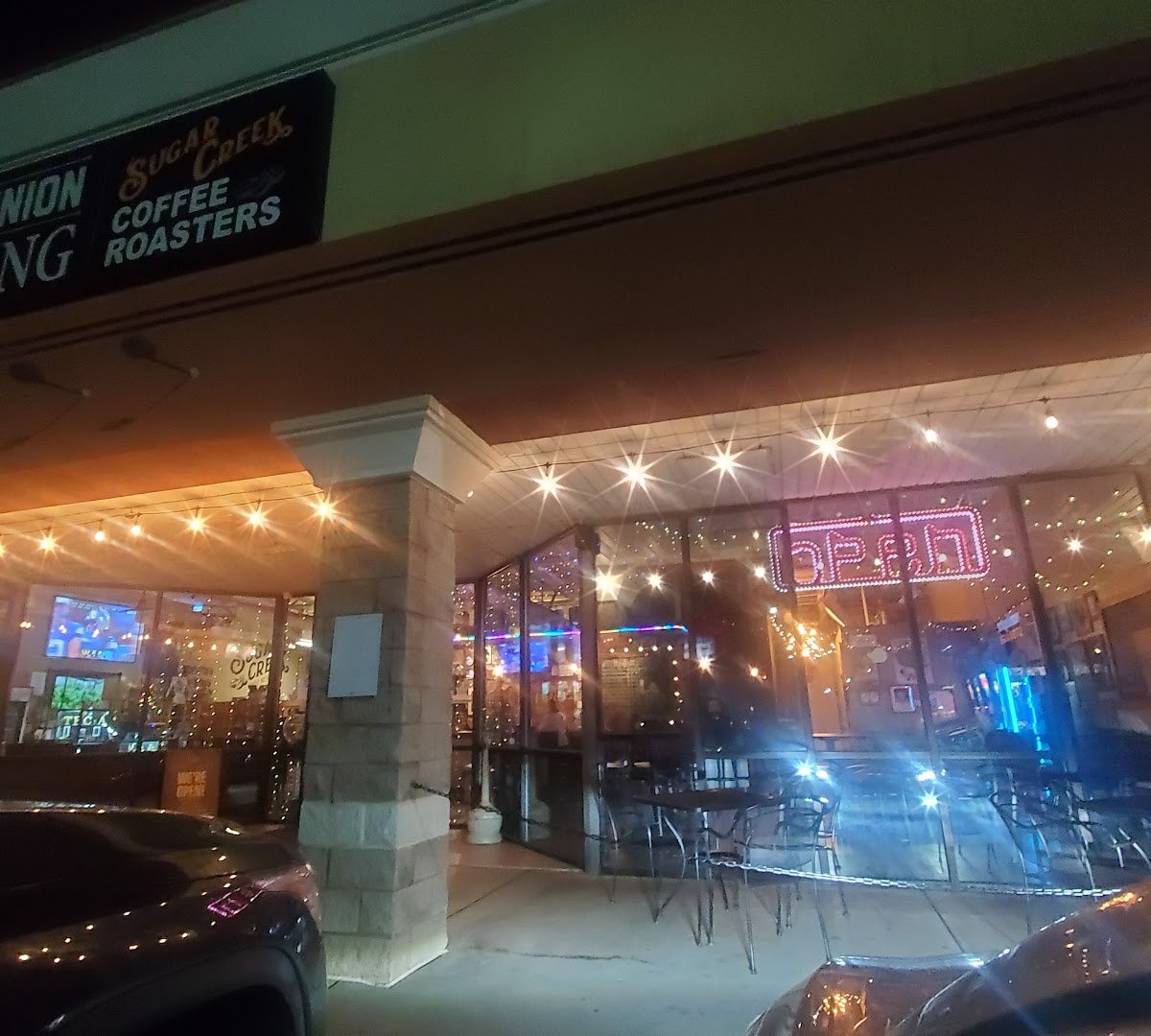 Storefront of Sugar Creek Coffee Roasters, specialty coffee shop in Charlotte