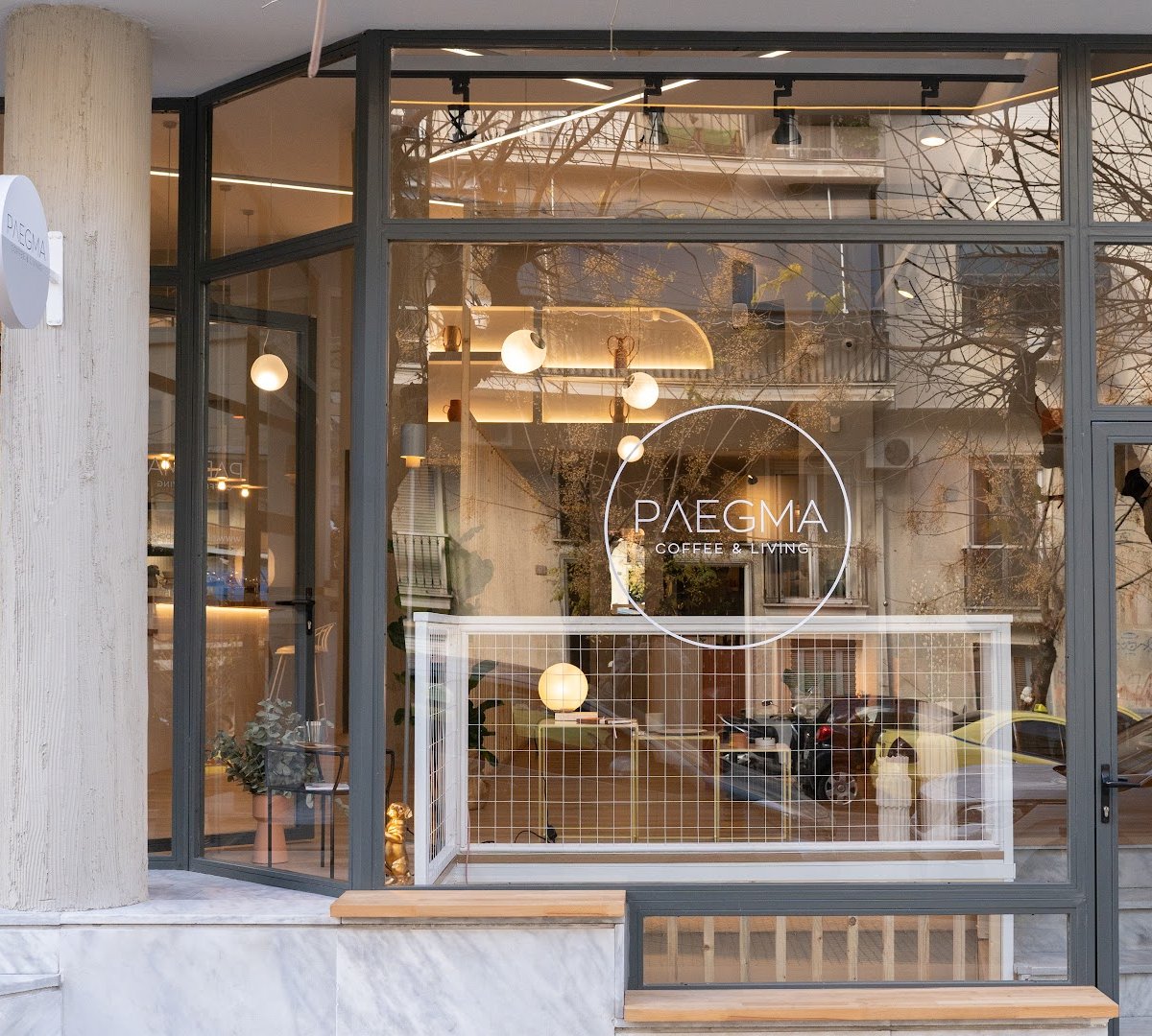 Storefront of Plegma Coffee & Living, specialty coffee shop in Athens