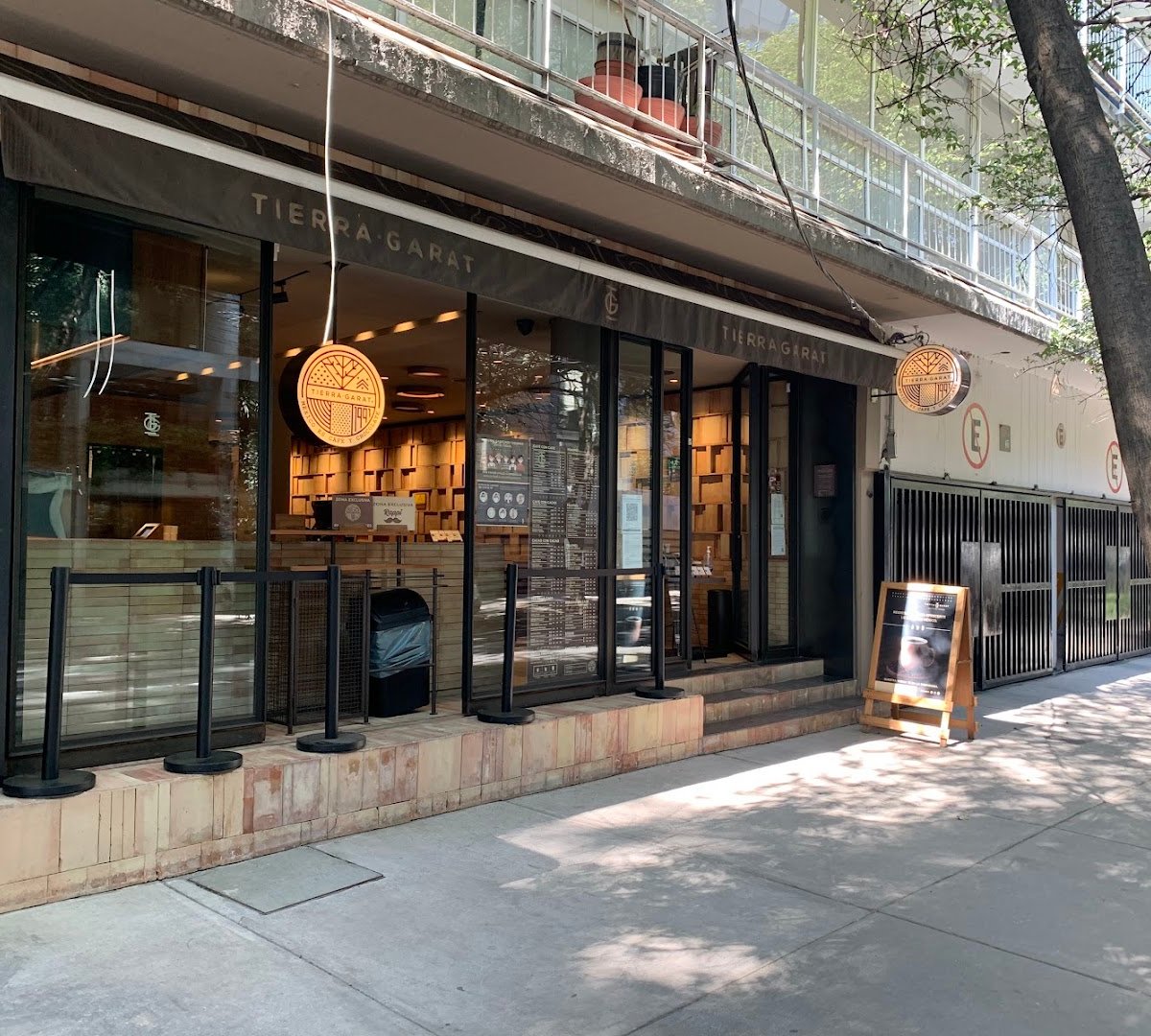 Storefront of Tierra Garat Amsterdam, specialty coffee shop in Mexico City