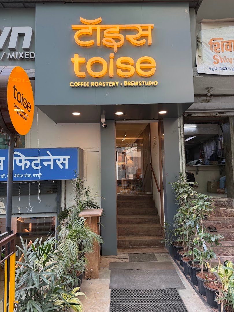 Storefront of Toise Coffee Roastery + Brewstudio, specialty coffee shop in Mumbai