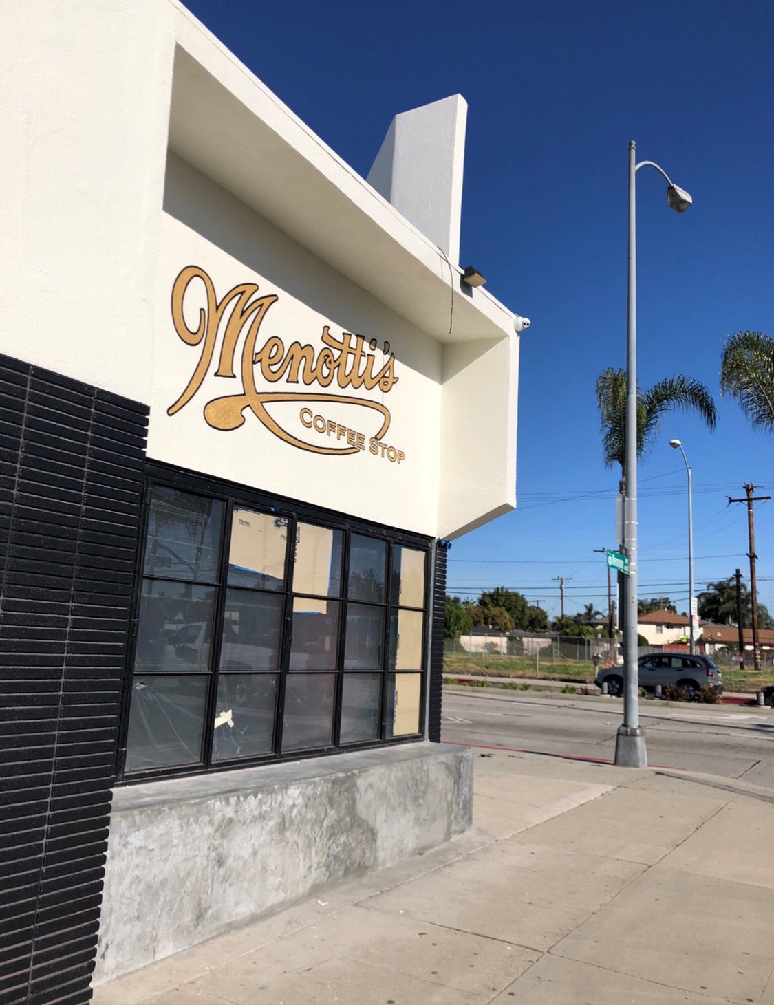Storefront of Menotti's Coffee Stop, specialty coffee shop in Los Angeles