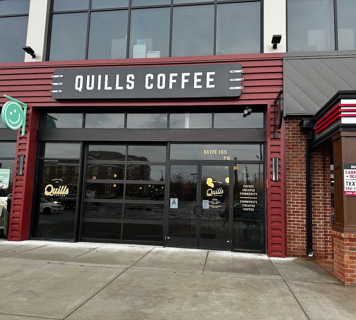 Storefront of Quills Coffee, specialty coffee shop in Louisville