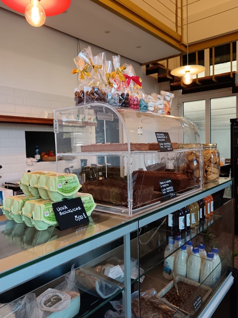 Interior of Hettaro Marconi bottega e mescite, specialty coffee shop in Rome