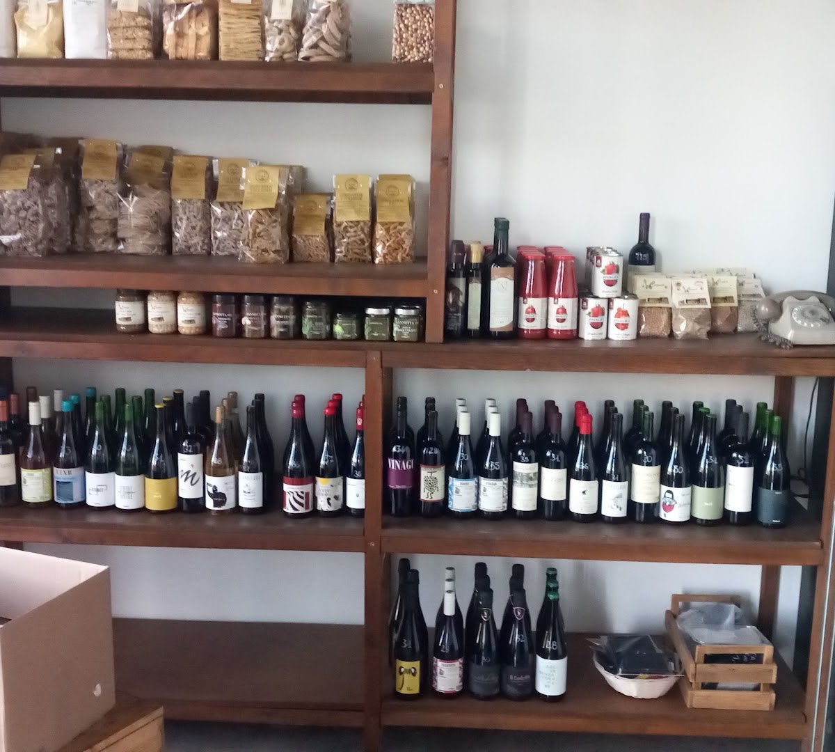 Interior of Hettaro Marconi bottega e mescite, specialty coffee shop in Rome