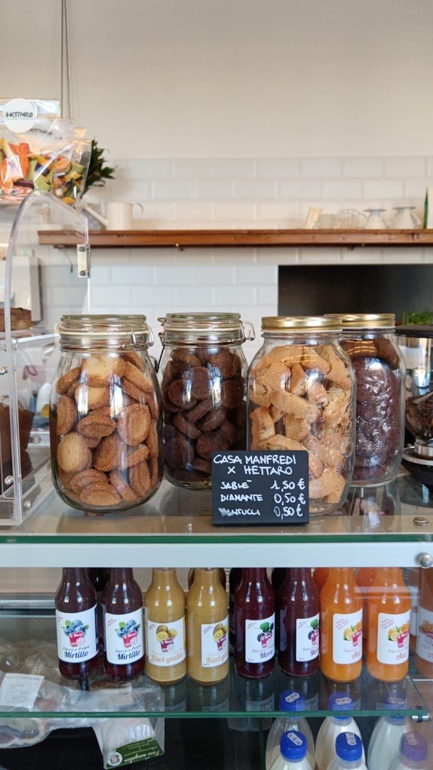Interior of Hettaro Marconi bottega e mescite, specialty coffee shop in Rome
