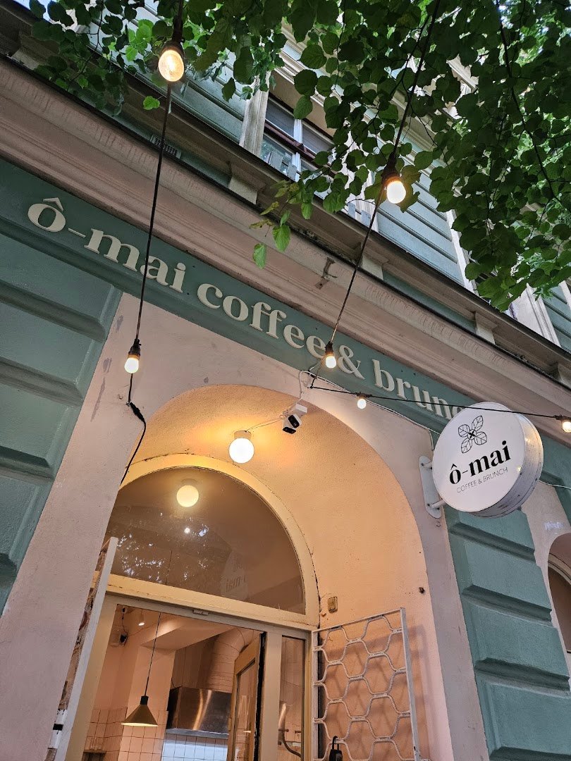 Storefront of ô-mai Coffee & Brunch, specialty coffee shop in Prague