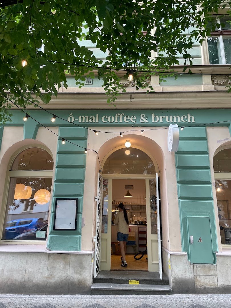 Storefront of ô-mai Coffee & Brunch, specialty coffee shop in Prague