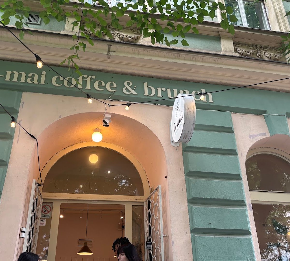 Storefront of ô-mai Coffee & Brunch, specialty coffee shop in Prague