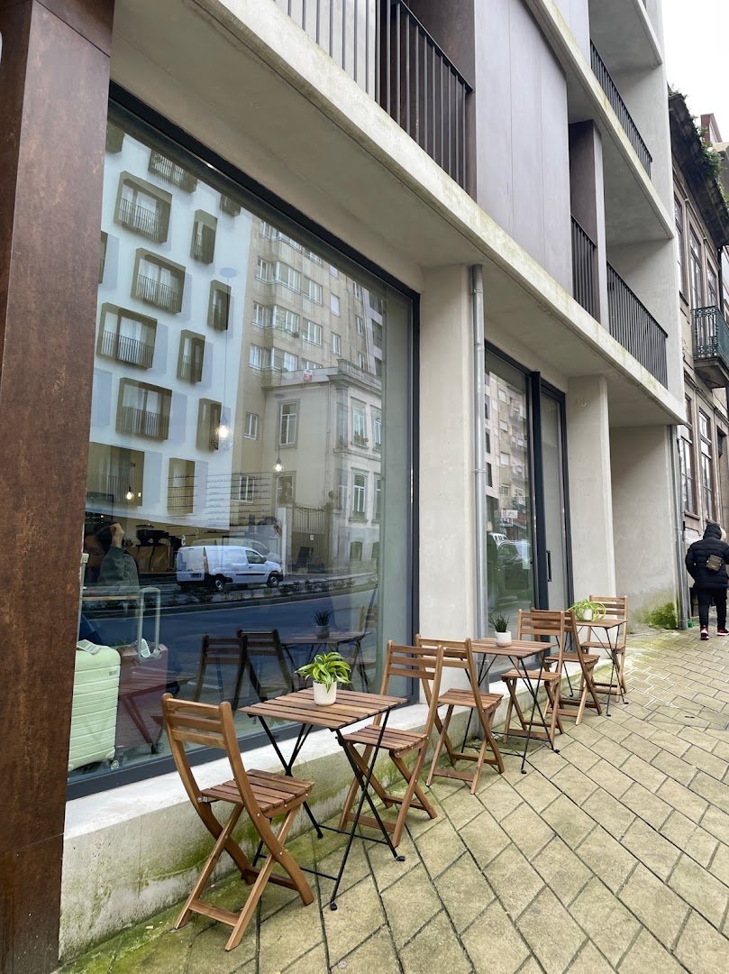 Storefront of Café Passaporte, specialty coffee shop in Porto