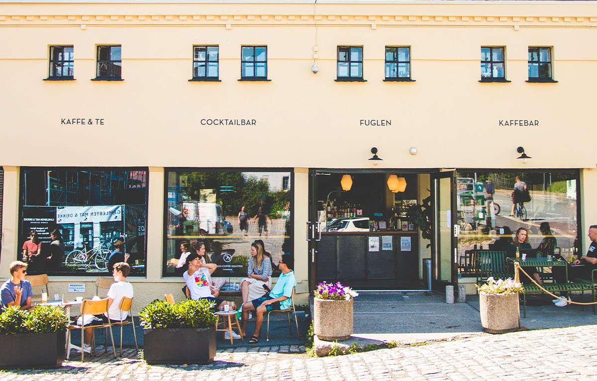 Storefront of Fuglen Coffee Roasters, specialty coffee shop in Oslo