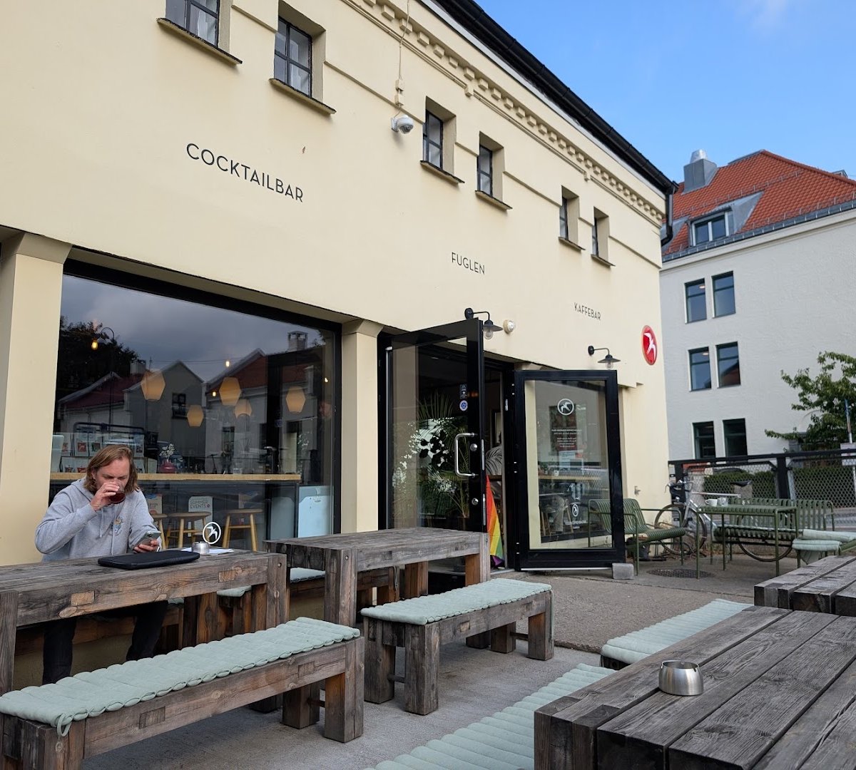 Storefront of Fuglen Coffee Roasters, specialty coffee shop in Oslo