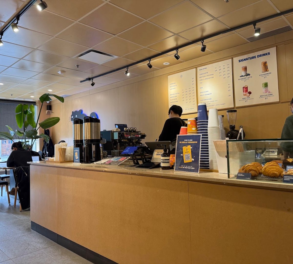 Interior of De Mello Coffee, specialty coffee shop in Toronto