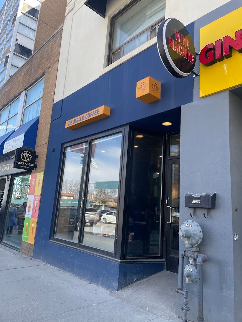 Storefront of De Mello Coffee, specialty coffee shop in Toronto