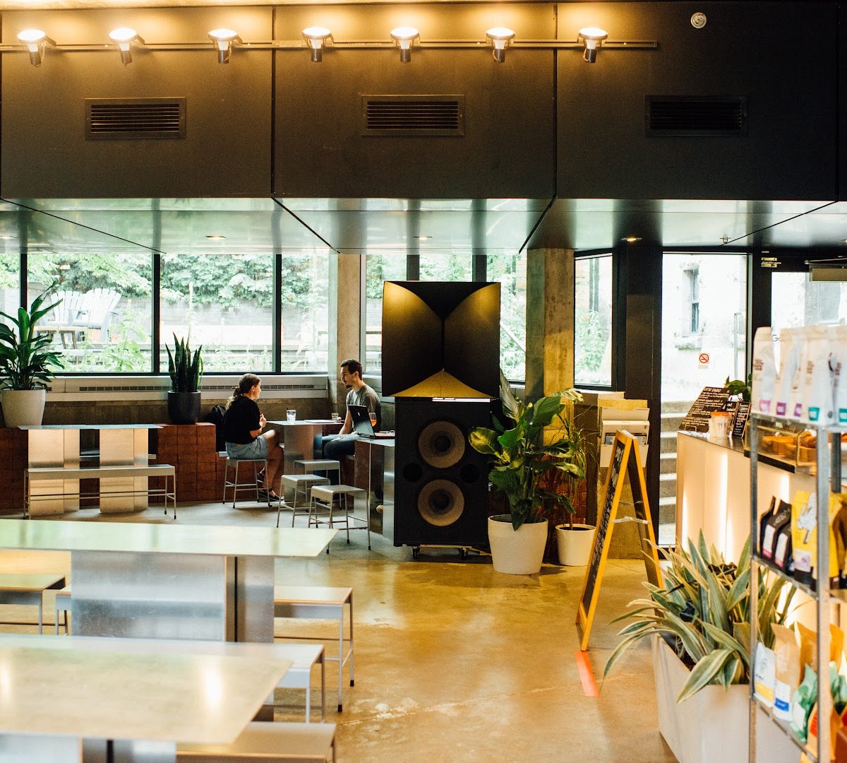 Interior of OSMO X MARUSAN Café-Terrasse, specialty coffee shop in Montreal