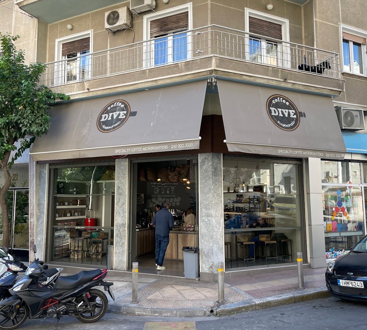 Storefront of Coffee Dive, specialty coffee shop in Athens