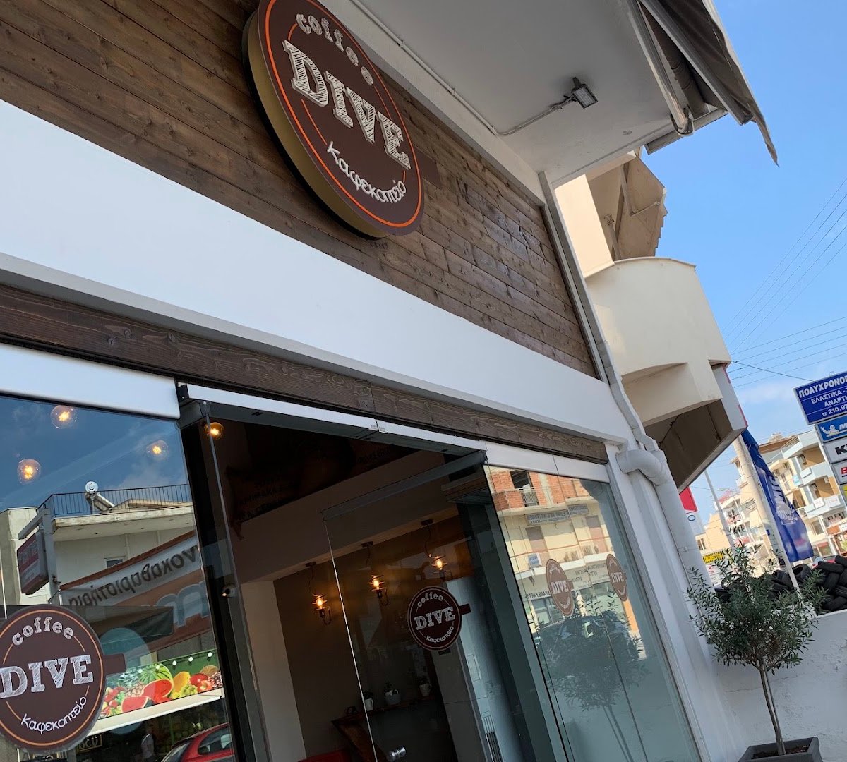 Storefront of Coffee Dive, specialty coffee shop in Athens