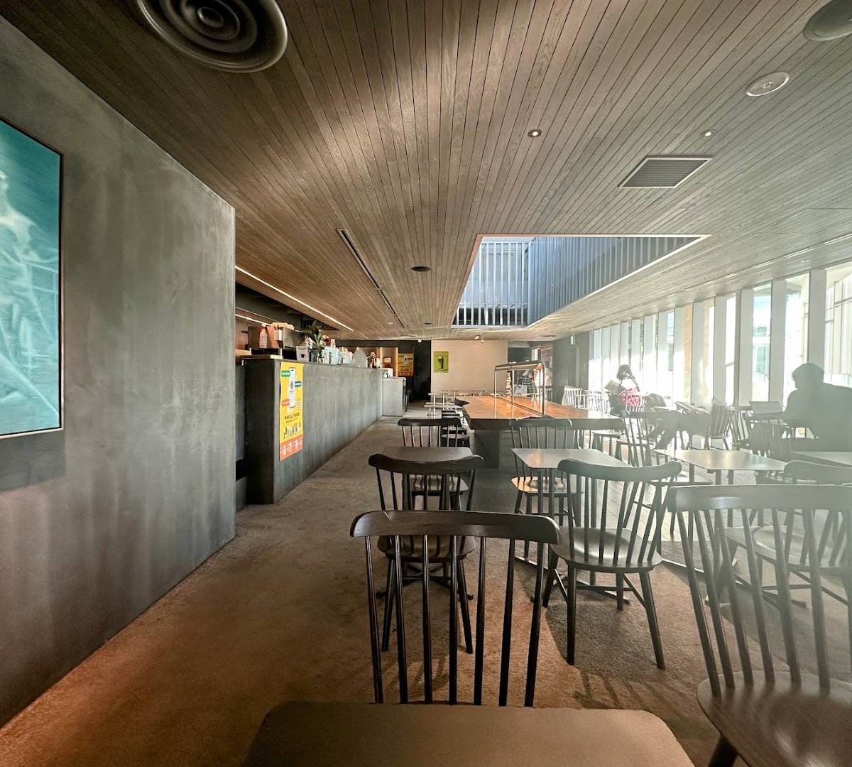 Interior of Sarutahiko Coffee The Bridge, specialty coffee shop in Tokyo