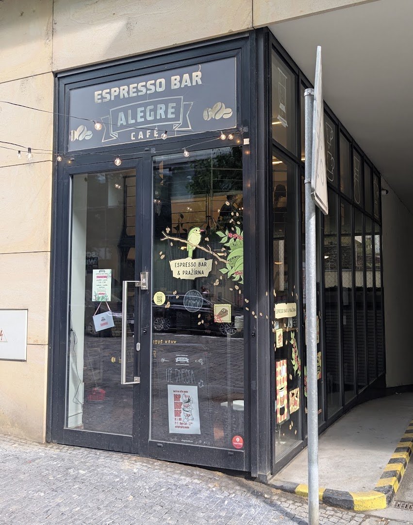 Storefront of Café Alegre, specialty coffee shop in Prague