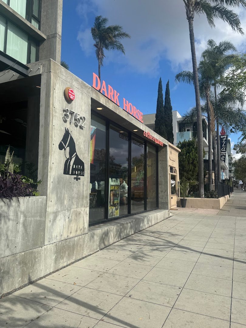 Storefront of Dark Horse Coffee Roasters, specialty coffee shop in San Diego