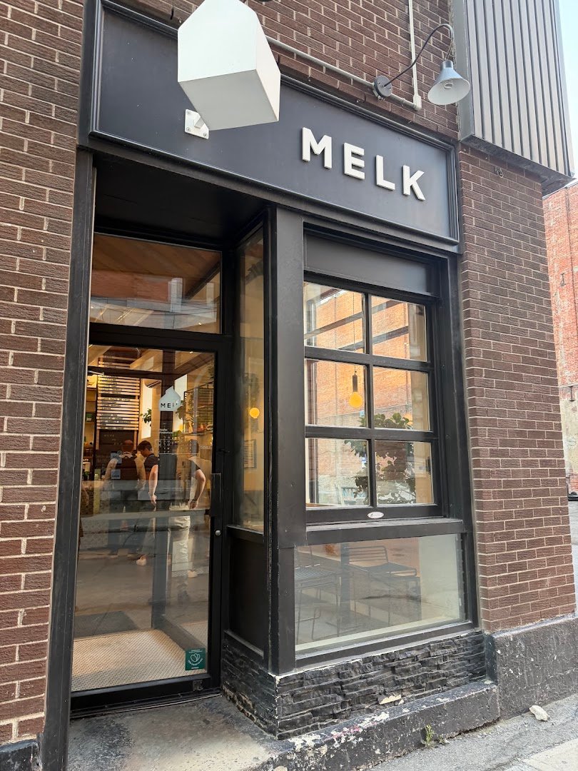 Storefront of Melk Café Stanley, specialty coffee shop in Montreal
