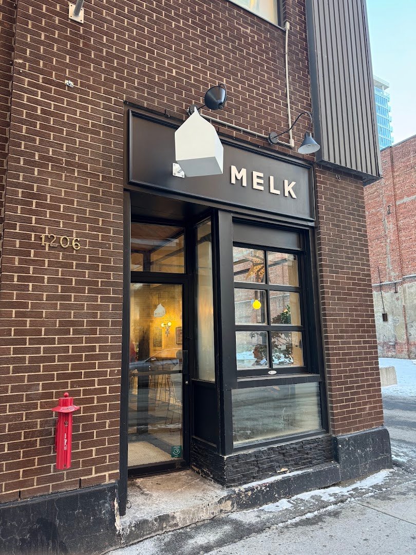 Storefront of Melk Café Stanley, specialty coffee shop in Montreal