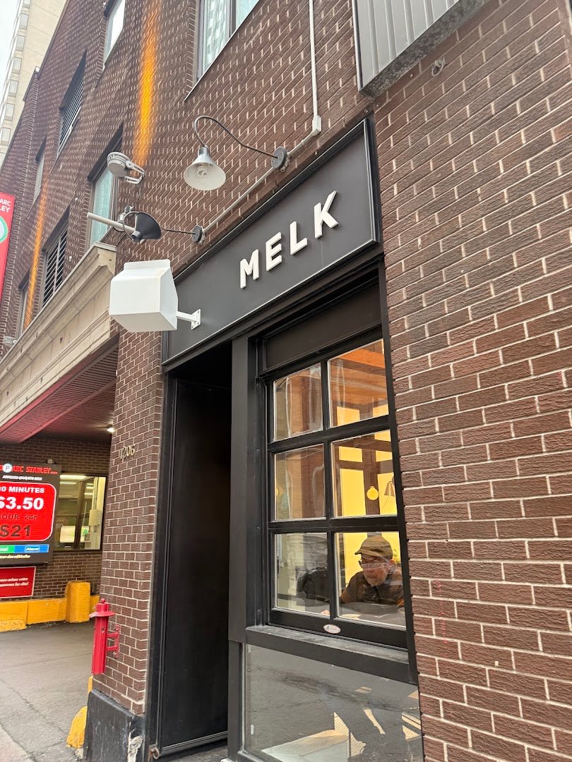 Storefront of Melk Café Stanley, specialty coffee shop in Montreal