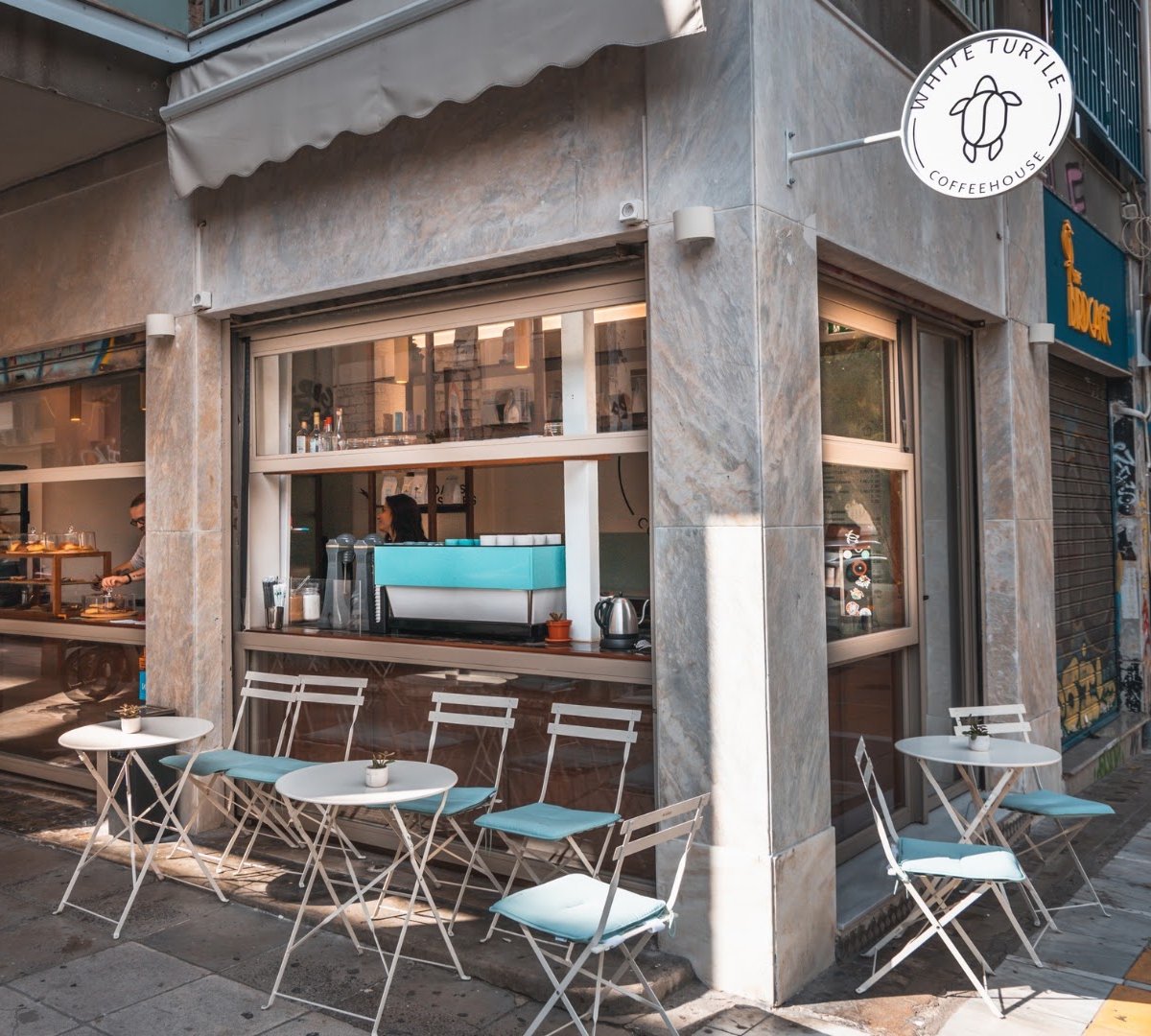 Storefront of White Turtle Coffeehouse, specialty coffee shop in Athens