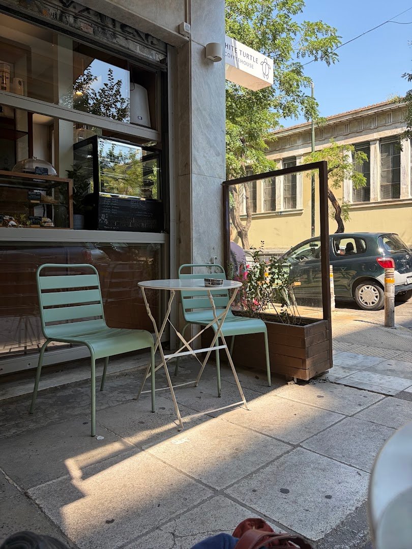 Storefront of White Turtle Coffeehouse, specialty coffee shop in Athens